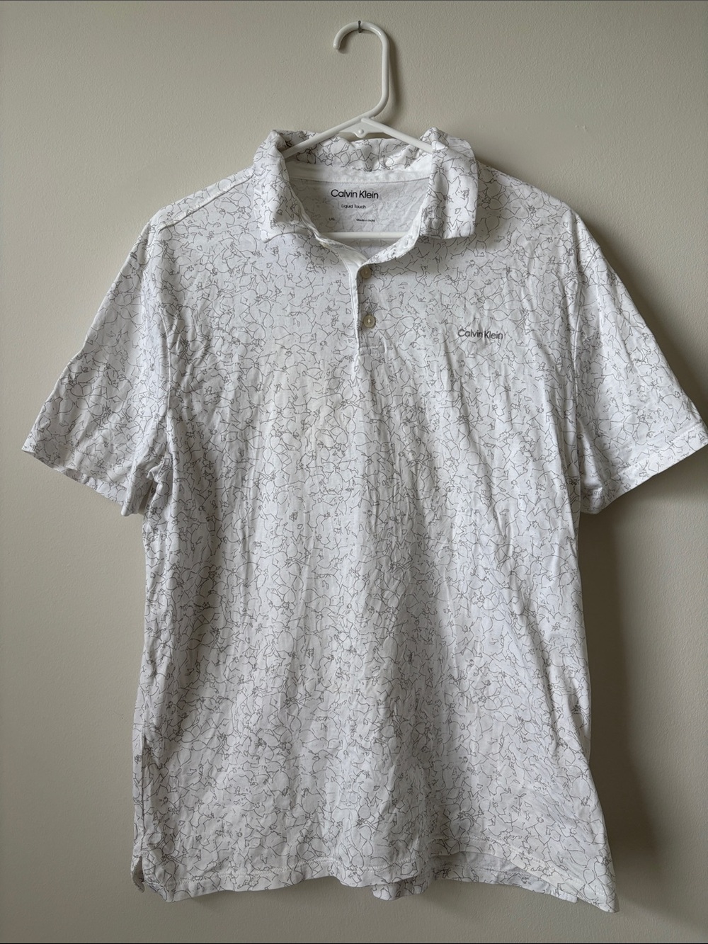 Calvin Klein White Polo with Subtle Gray Line Pattern